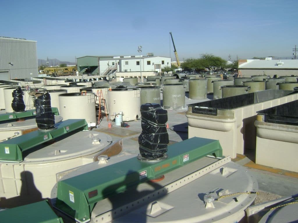 Dozens of mixer units in manufacturing yard